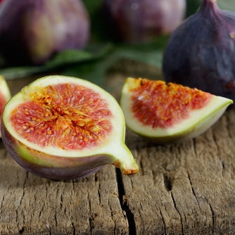 a ripe fig cut in half