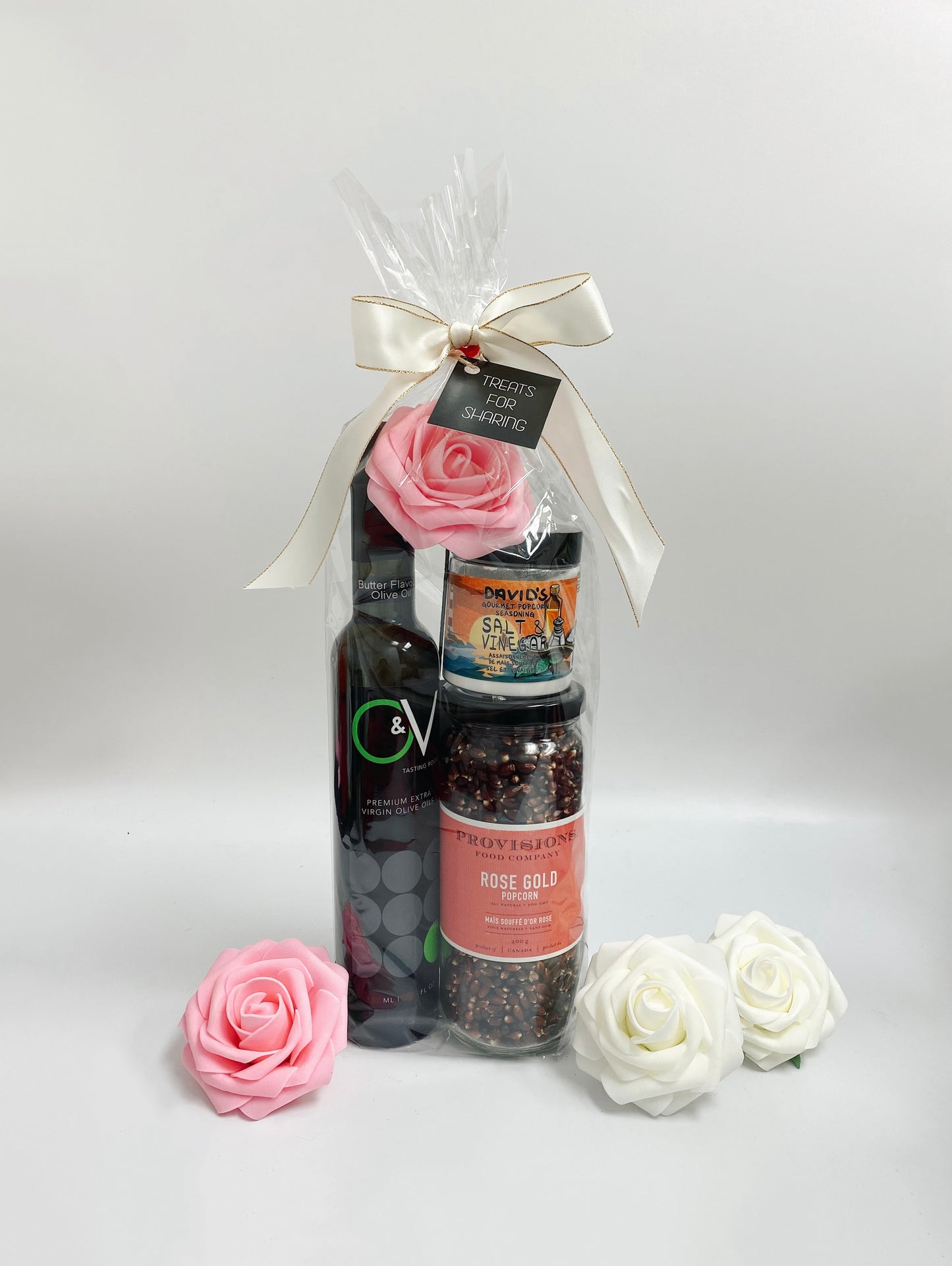 Gift set - date night - butter olive oil- popcorn - popcorn salt- wrapped in cello with a flower and bow 